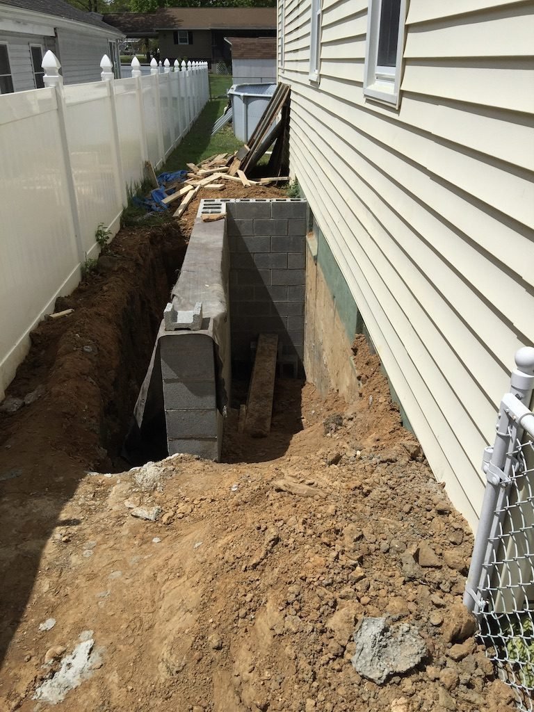 Exterior basement stairs in Baltimore, MD, before - Maryland Home Improvement Company