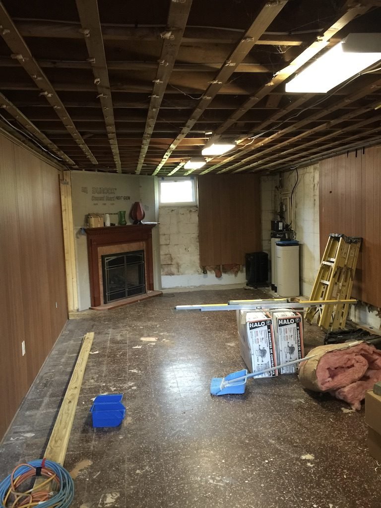 Fireplace room floor in Baltimore, MD, before - Maryland Home Improvement Company