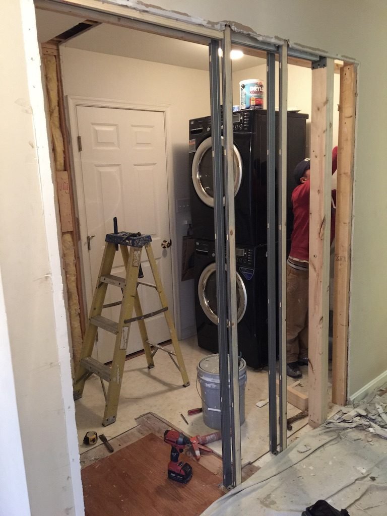 Laundry pocket door in Ellicott City, MD, before - Maryland Home Improvement Company