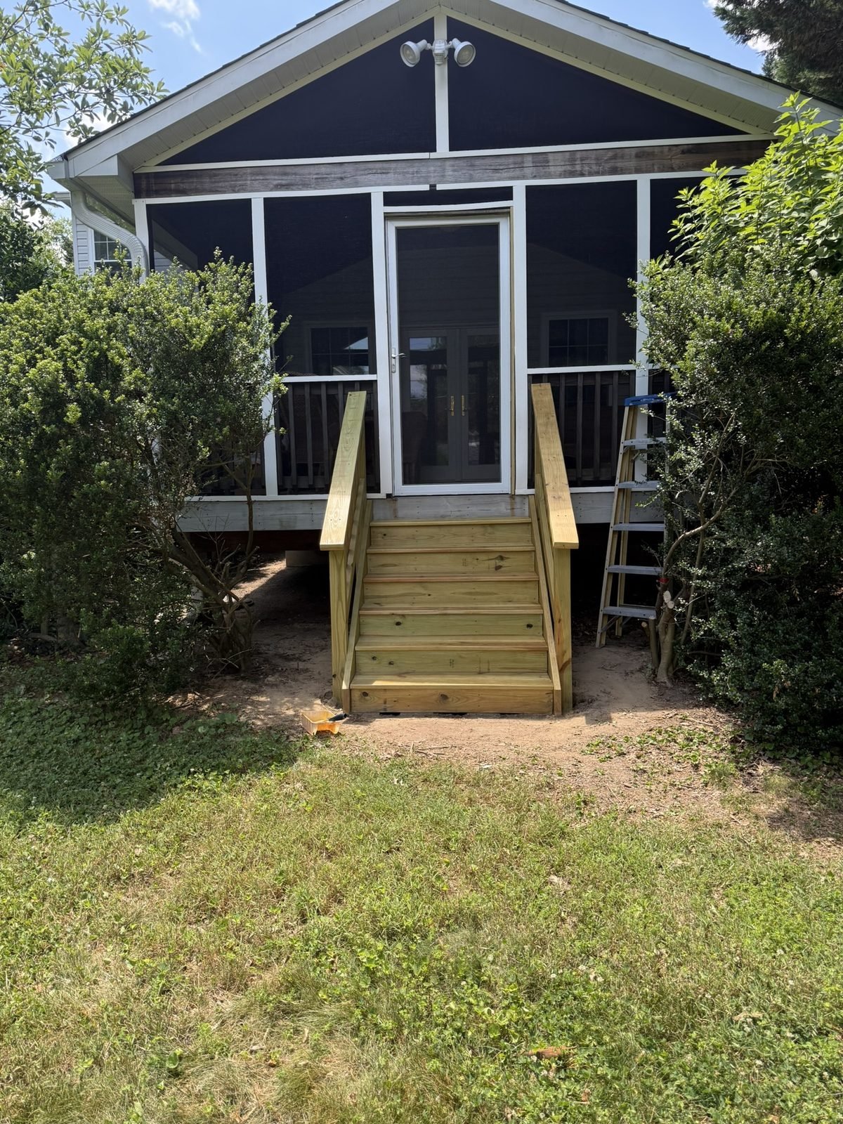 Screened porch steps and screen door in Severna Park, MD, after - Maryland Home Improvement Company
