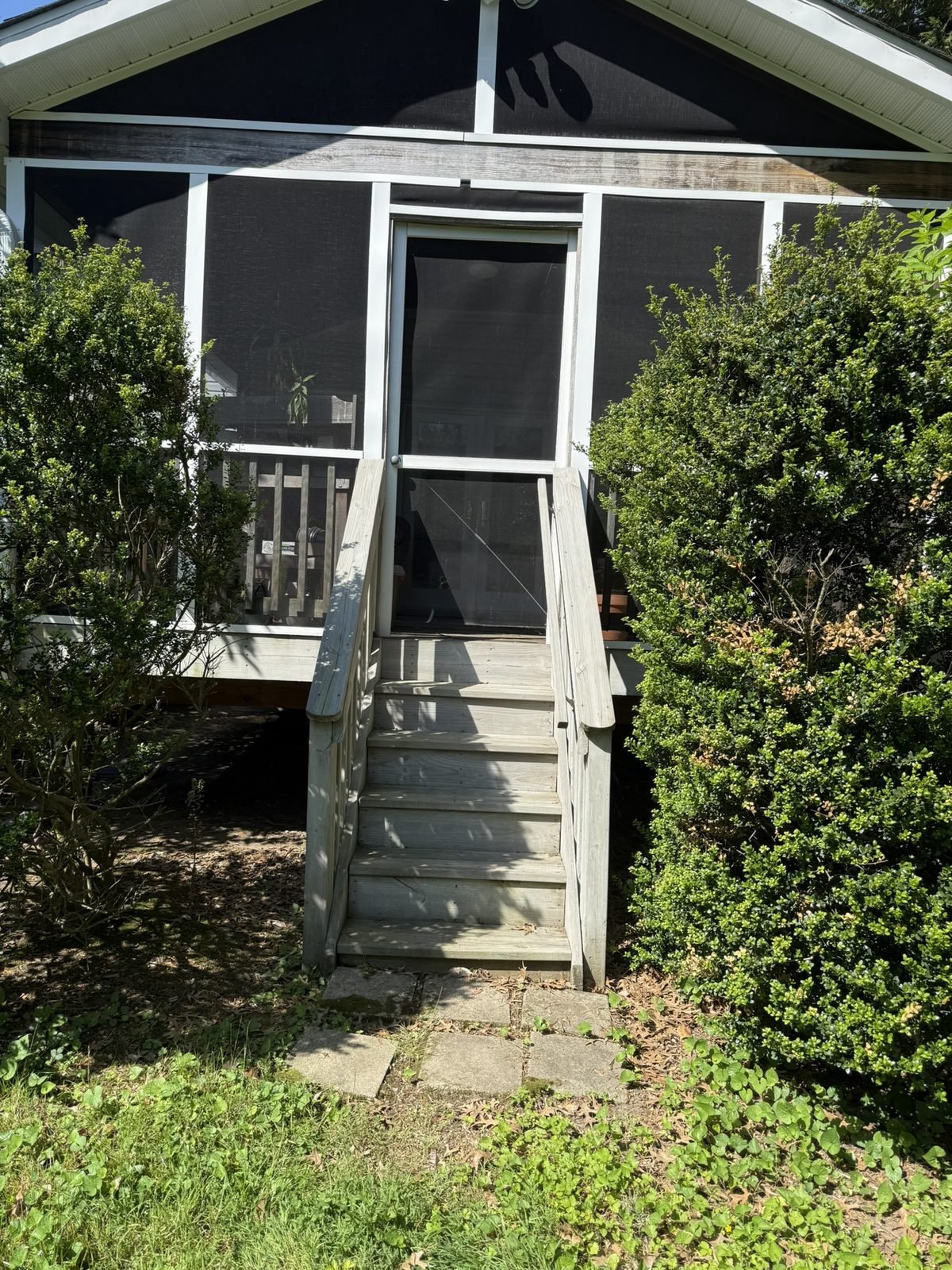Screened porch steps and screen door in Severna Park, MD, before - Maryland Home Improvement Company