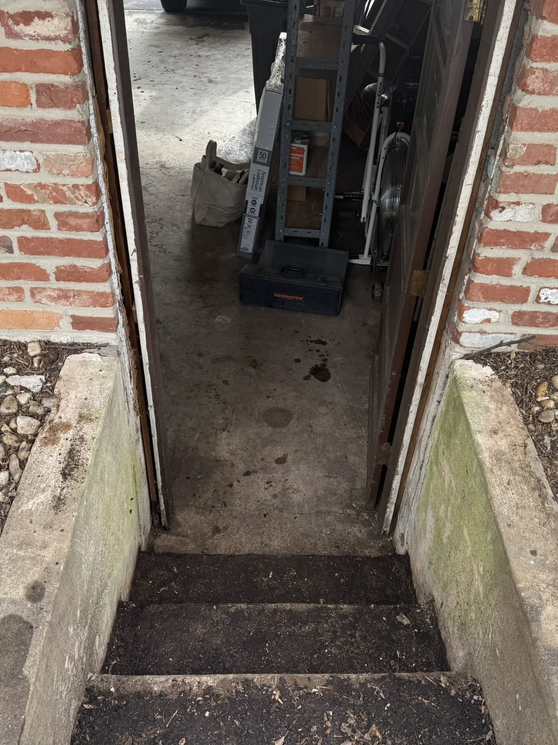 Garage window in Columbia, MD, before - Maryland Home Improvement Company